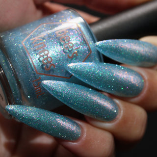 Image provided for Bee's Knees by a paid swatcher featuring the nail polish " Heartbreak "