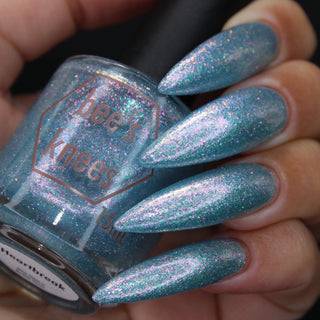 Image provided for Bee's Knees by a paid swatcher featuring the nail polish " Heartbreak "