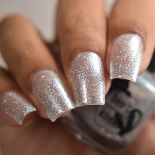 Image provided for Bee's Knees by a paid swatcher featuring the nail polish " Hold Your Unicorns "