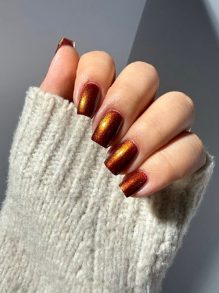 Image provided for Bee's Knees by a paid swatcher featuring the nail polish " The Bar is in Hell "