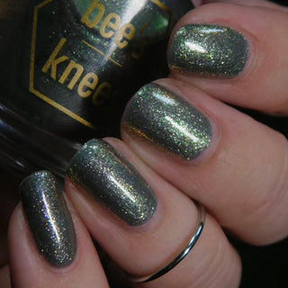 Image provided for Bee's Knees by a paid swatcher featuring the nail polish " Denial "