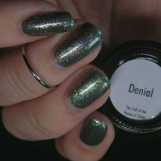 Image provided for Bee's Knees by a paid swatcher featuring the nail polish " Denial "