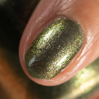 Image provided for Bee's Knees by a paid swatcher featuring the nail polish " Denial "