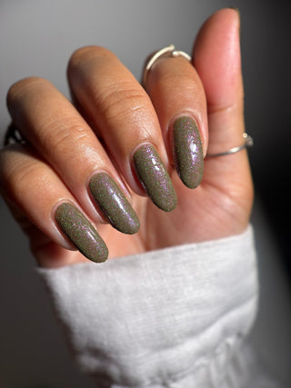 Image provided for Bee's Knees by a paid swatcher featuring the nail polish " Boil Beetle Venom "