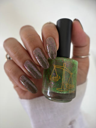 Image provided for Bee's Knees by a paid swatcher featuring the nail polish " Boil Beetle Venom "