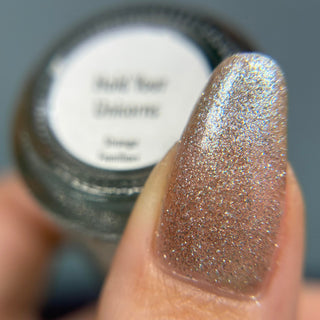 Image provided for Bee's Knees by a paid swatcher featuring the nail polish " Hold Your Unicorns "