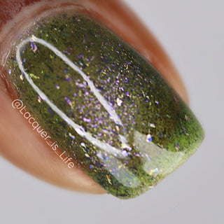 Image provided for Bee's Knees by a paid swatcher featuring the nail polish " What's a Little Blackmail Between Friends "