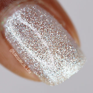 Image provided for Bee's Knees by a paid swatcher featuring the nail polish " Hold Your Unicorns "