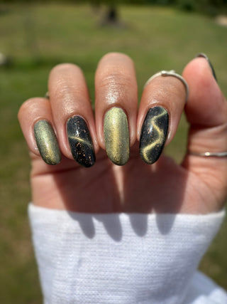 Image provided for Bee's Knees by a paid swatcher featuring the nail polish " Stormfall "