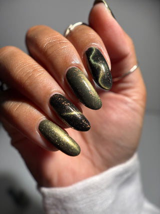 Image provided for Bee's Knees by a paid swatcher featuring the nail polish " Stormfall "