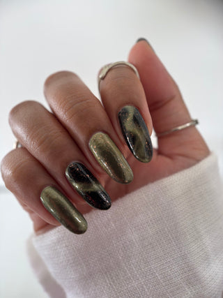 Image provided for Bee's Knees by a paid swatcher featuring the nail polish " Stormfall "