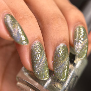 Image provided for Bee's Knees by a paid swatcher featuring the nail polish " What's a Little Blackmail Between Friends "