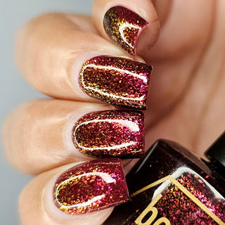 Image provided for Bee's Knees by a paid swatcher featuring the nail polish " Immutable "