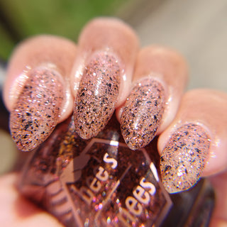 Image provided for Bee's Knees by a paid swatcher featuring the nail polish " My Place was Never in this World "