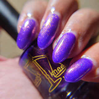Image provided for Bee's Knees by a paid swatcher featuring the nail polish " The Great Unraveling "