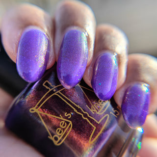 Image provided for Bee's Knees by a paid swatcher featuring the nail polish " The Great Unraveling "