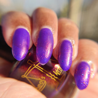 Image provided for Bee's Knees by a paid swatcher featuring the nail polish " The Great Unraveling "