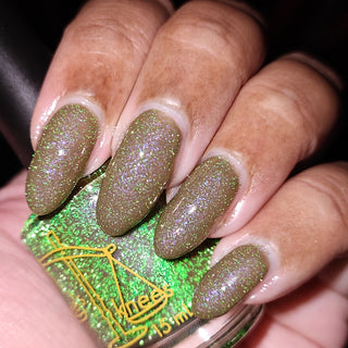 Image provided for Bee's Knees by a paid swatcher featuring the nail polish " Boil Beetle Venom "