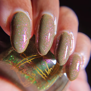 Image provided for Bee's Knees by a paid swatcher featuring the nail polish " Boil Beetle Venom "