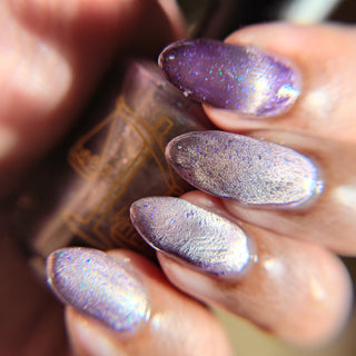 Image provided for Bee's Knees by a paid swatcher featuring the nail polish " A True Illusionist "