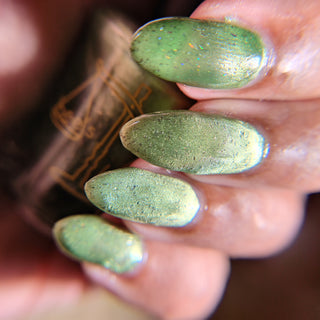 Image provided for Bee's Knees by a paid swatcher featuring the nail polish " Coercer "