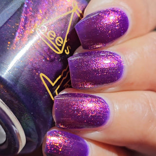 Image provided for Bee's Knees by a paid swatcher featuring the nail polish " The Great Unraveling "