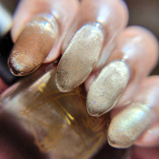 Image provided for Bee's Knees by a paid swatcher featuring the nail polish " Violentia nervus potestas "