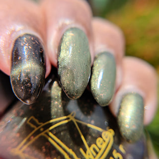 Image provided for Bee's Knees by a paid swatcher featuring the nail polish " Stormfall "
