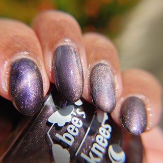 Image provided for Bee's Knees by a paid swatcher featuring the nail polish " Knight, Knave, Optimist "