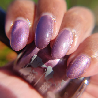 Image provided for Bee's Knees by a paid swatcher featuring the nail polish " Permit Me "