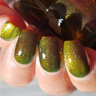 Image provided for Bee's Knees by a paid swatcher featuring the nail polish " I'm Nobody "