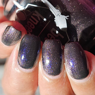 Image provided for Bee's Knees by a paid swatcher featuring the nail polish " Knight, Knave, Optimist "