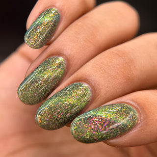 Image provided for Bee's Knees by a paid swatcher featuring the nail polish " Magiphilia "