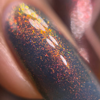 Image provided for Bee's Knees by a paid swatcher featuring the nail polish " Firedancer "