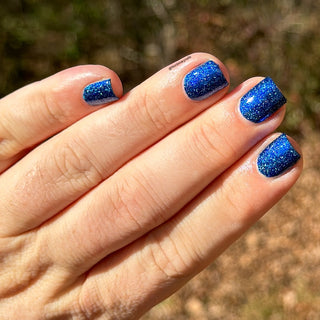 Image provided for Bee's Knees by a paid swatcher featuring the nail polish " Game Playing Deviant "