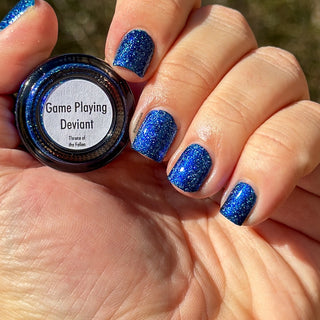 Image provided for Bee's Knees by a paid swatcher featuring the nail polish " Game Playing Deviant "