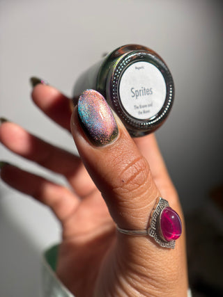 Image provided for Bee's Knees by a paid swatcher featuring the nail polish " Sprites "