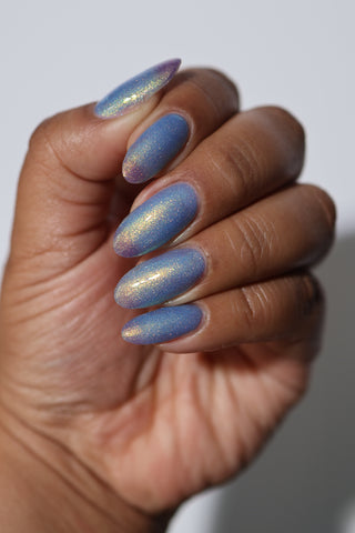 Image provided for Bee's Knees by a paid swatcher featuring the nail polish " Let the Ocean Take Me "