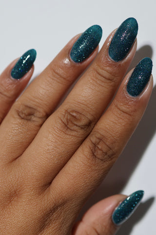 Image provided for Bee's Knees by a paid swatcher featuring the nail polish " From the Depths "
