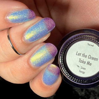 Image provided for Bee's Knees by a paid swatcher featuring the nail polish " Let the Ocean Take Me "