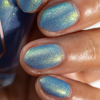 Image provided for Bee's Knees by a paid swatcher featuring the nail polish " Let the Ocean Take Me "