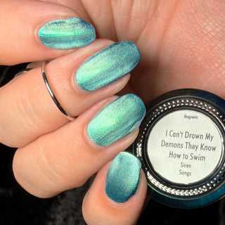 Image provided for Bee's Knees by a paid swatcher featuring the nail polish " I Can't Drown my Demons they Know How to Swim "