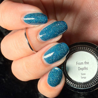 Image provided for Bee's Knees by a paid swatcher featuring the nail polish " From the Depths "