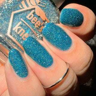 Image provided for Bee's Knees by a paid swatcher featuring the nail polish " From the Depths "