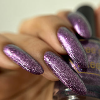 Image provided for Bee's Knees by a paid swatcher featuring the nail polish " Nevermore "