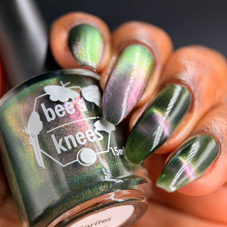 Image provided for Bee's Knees by a paid swatcher featuring the nail polish " Sprites "
