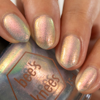 Image provided for Bee's Knees by a paid swatcher featuring the nail polish " The Archer's Curse "