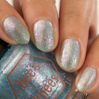 Image provided for Bee's Knees by a paid swatcher featuring the nail polish " Heartbreak "