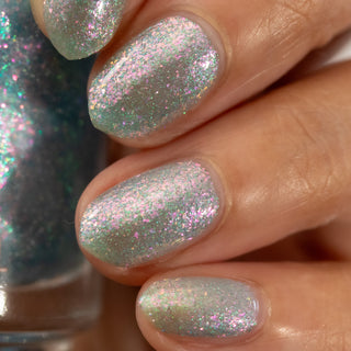 Image provided for Bee's Knees by a paid swatcher featuring the nail polish " Heartbreak "