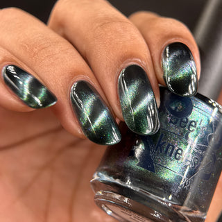 Image provided for Bee's Knees by a paid swatcher featuring the nail polish " Midnight Yoga and Seaweed "